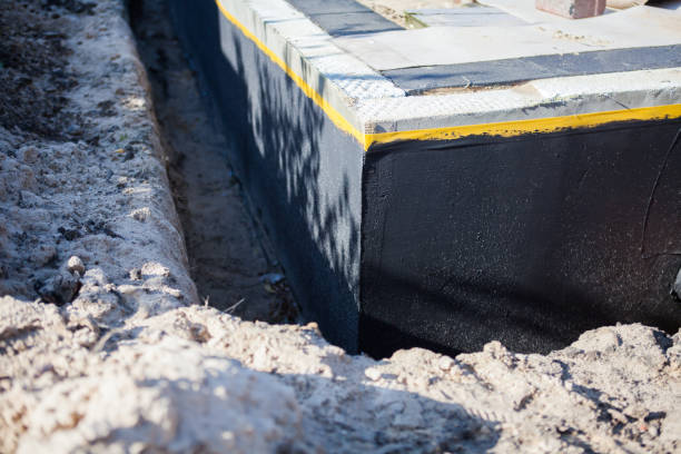 Professional Basement Waterproofing technician working in Bartlett, TN